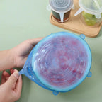 Reusable silicone lids creating airtight seals on food bowls