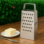 Close-up of 5-in-1 stainless steel grater blades for chopping, slicing, and grating.