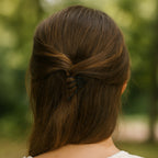 Black bobby pins arranged to demonstrate secure hold