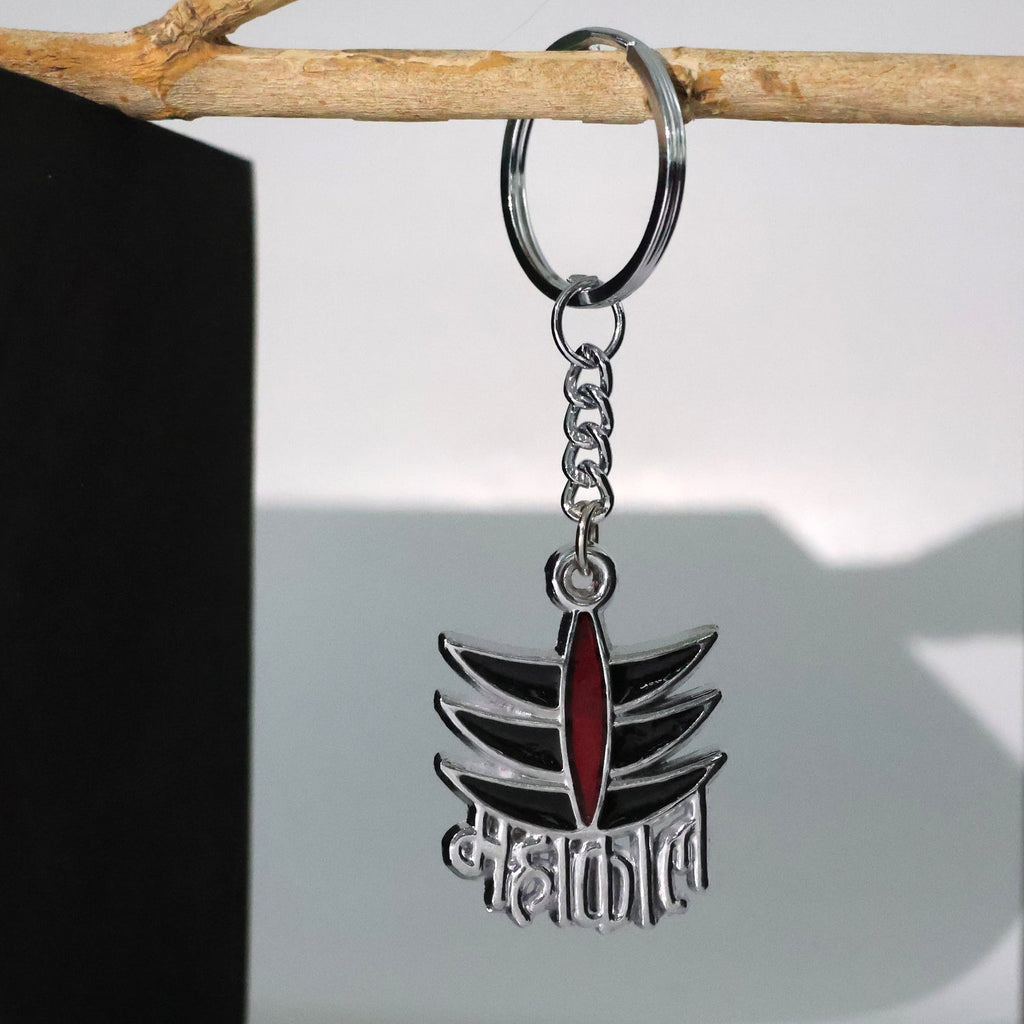 Side view of durable Mahakal metal keychain accessory