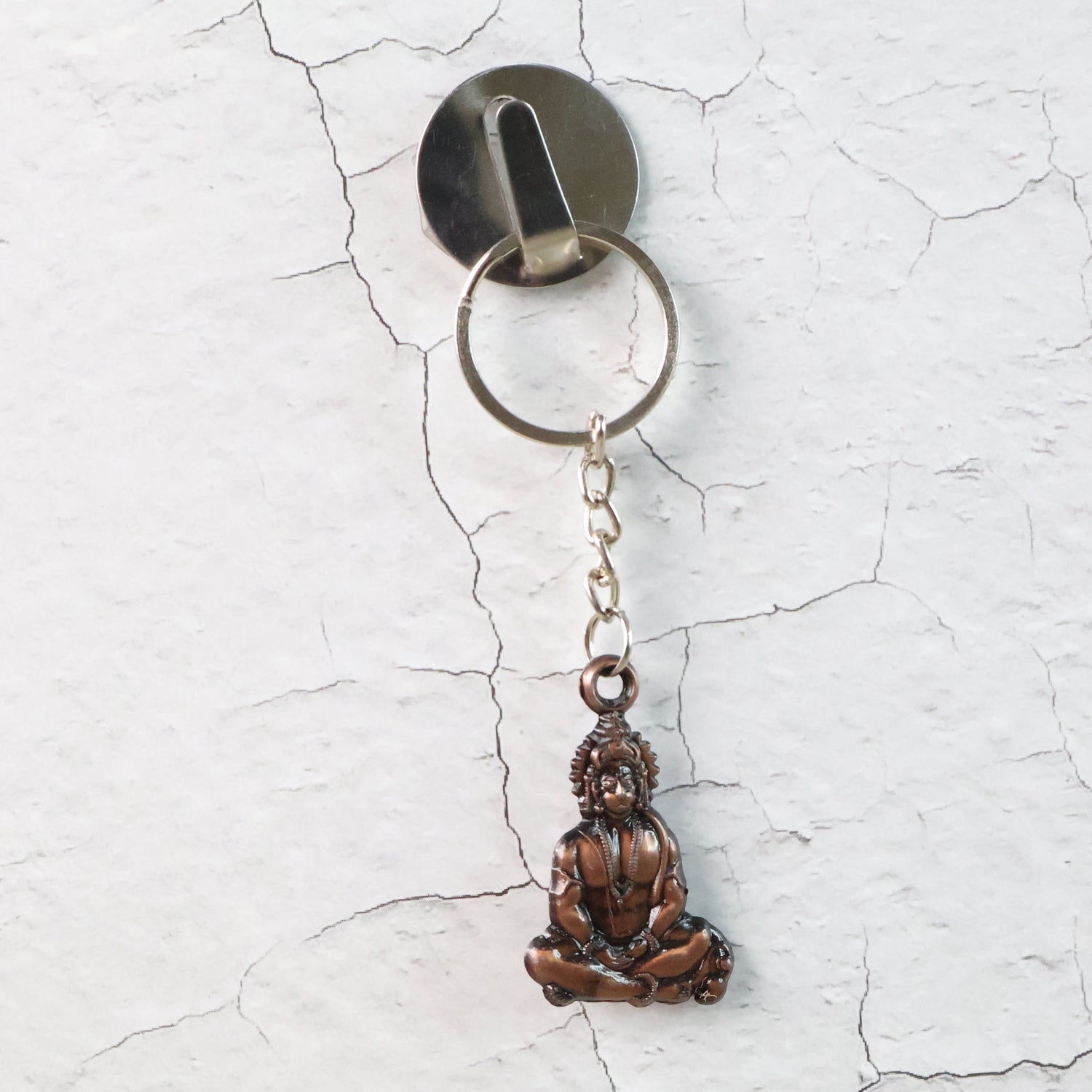 Close-up of Hanuman Blessing on durable metal keychain
