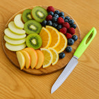 Utility knife cutting fresh vegetables with stainless steel blade