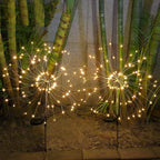 Two solar firework garden lights with wire-free solar powering