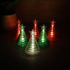 Set of 6 LED Christmas Tree Decorative Lights with star tops creating festive ambiance