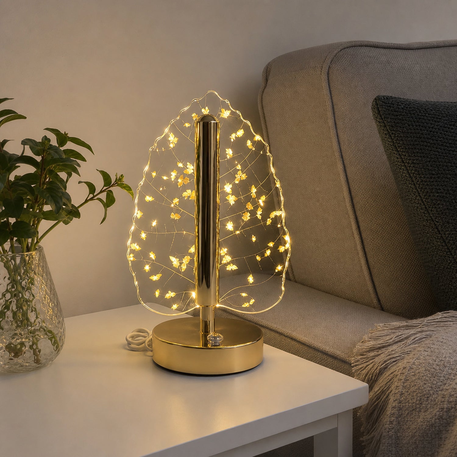Living room interior highlighting golden crystal leaf LED lamp decoration