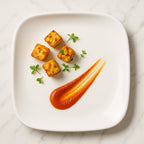 Close-up of 20 cm white square durable plastic plate for snacks