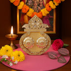 Close-up of the decorative Kalash design on the puja thali.