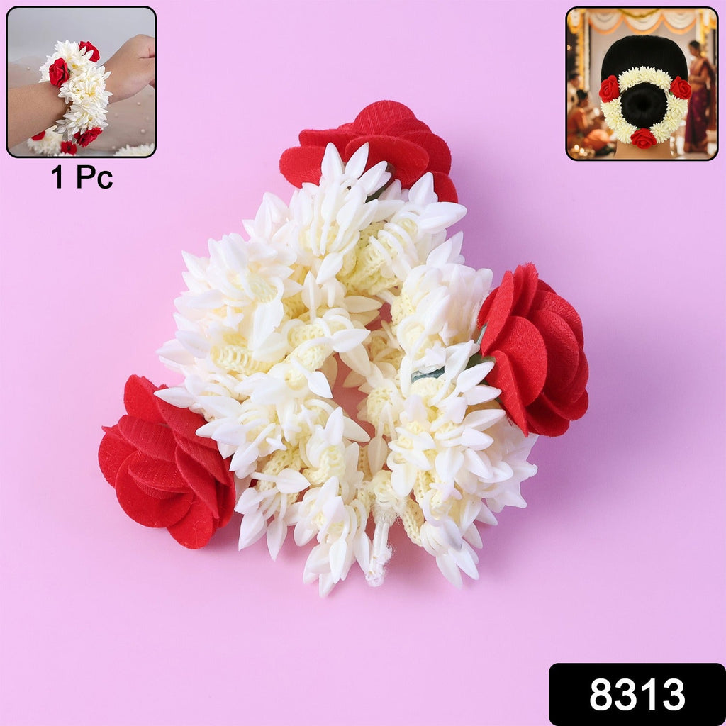 Red and white artificial flower gajra styled as traditional hair accessory