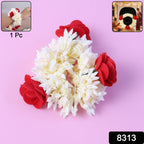 Red and white artificial flower gajra styled as traditional hair accessory