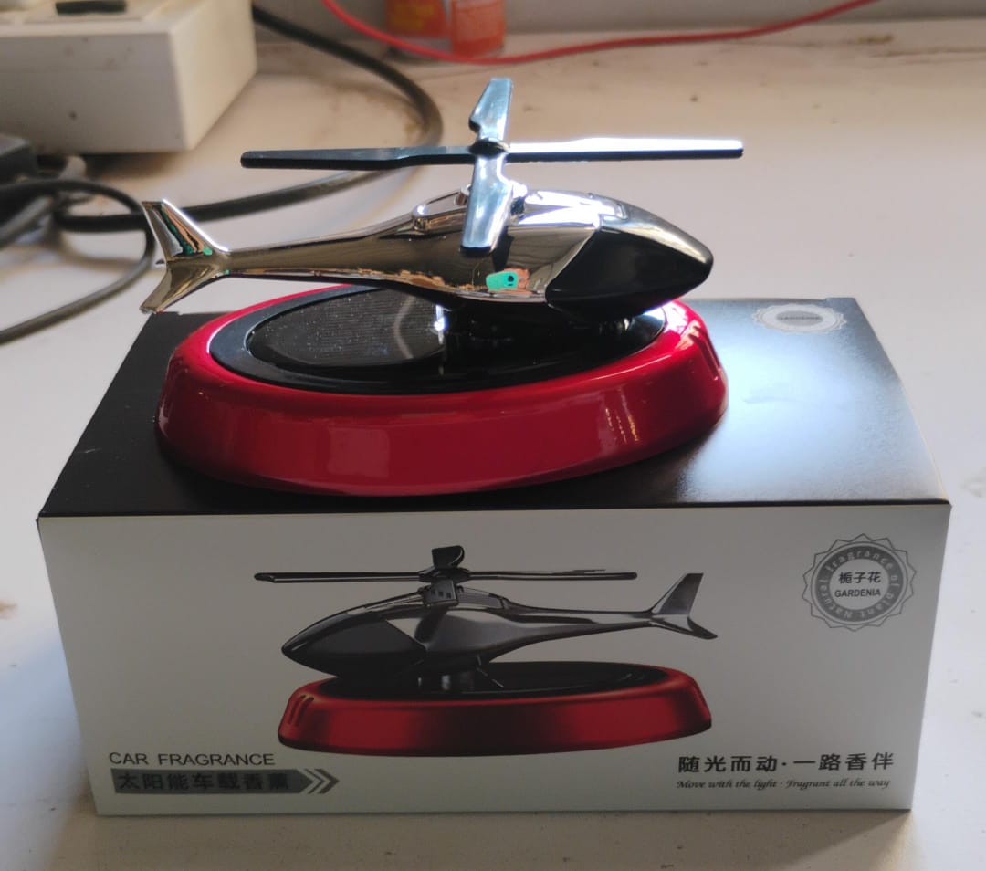 Solar helicopter air freshener with essential oil refill bottle