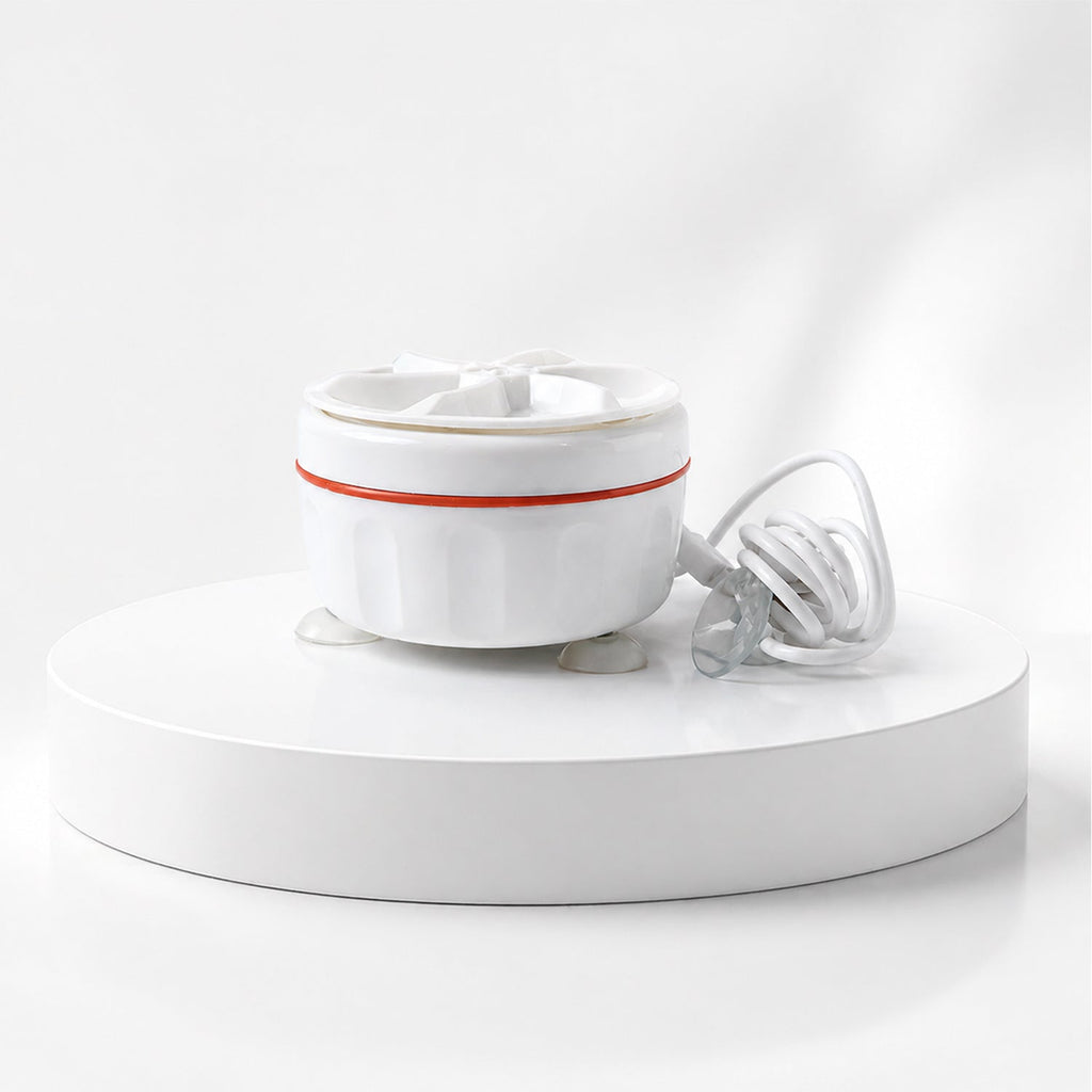 Mini washing machine with drain outlet for easy water removal