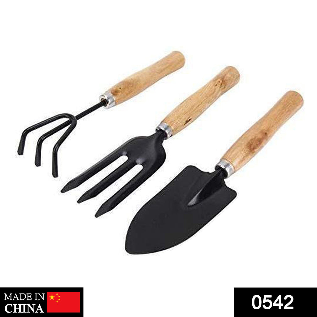 Overhead view of the durable 3-piece hand gardening tools set with ergonomic handles.