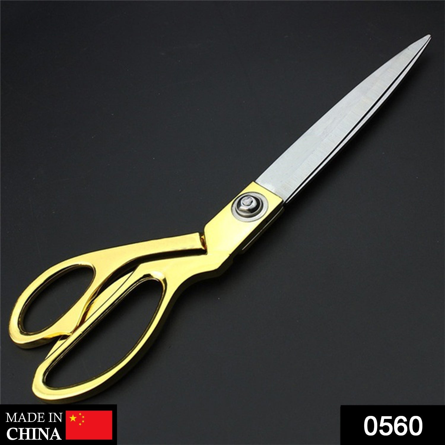 Close-up of Cisora's gold-plated cloth cutting scissors with sharp stainless steel blades.