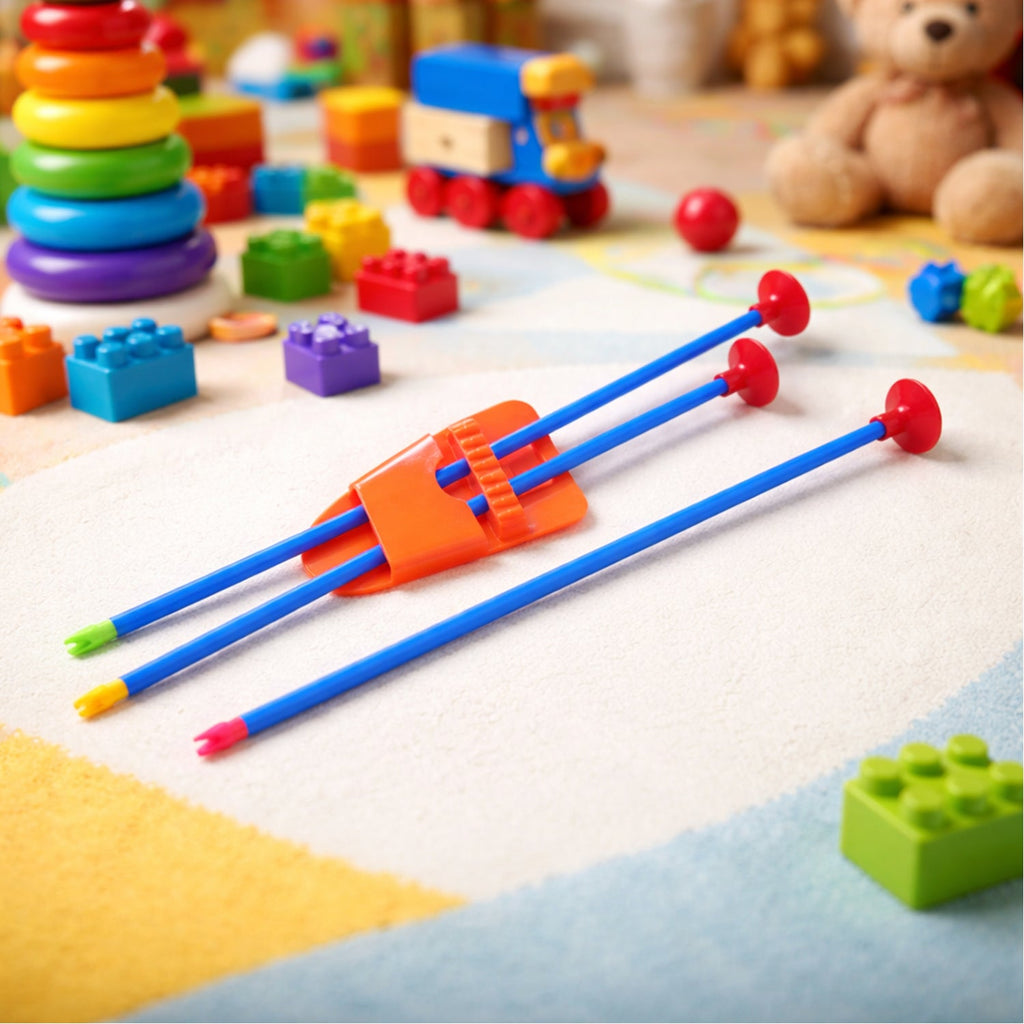 A detailed view of the plastic toy knife and arrows from the Kids Archery Set.