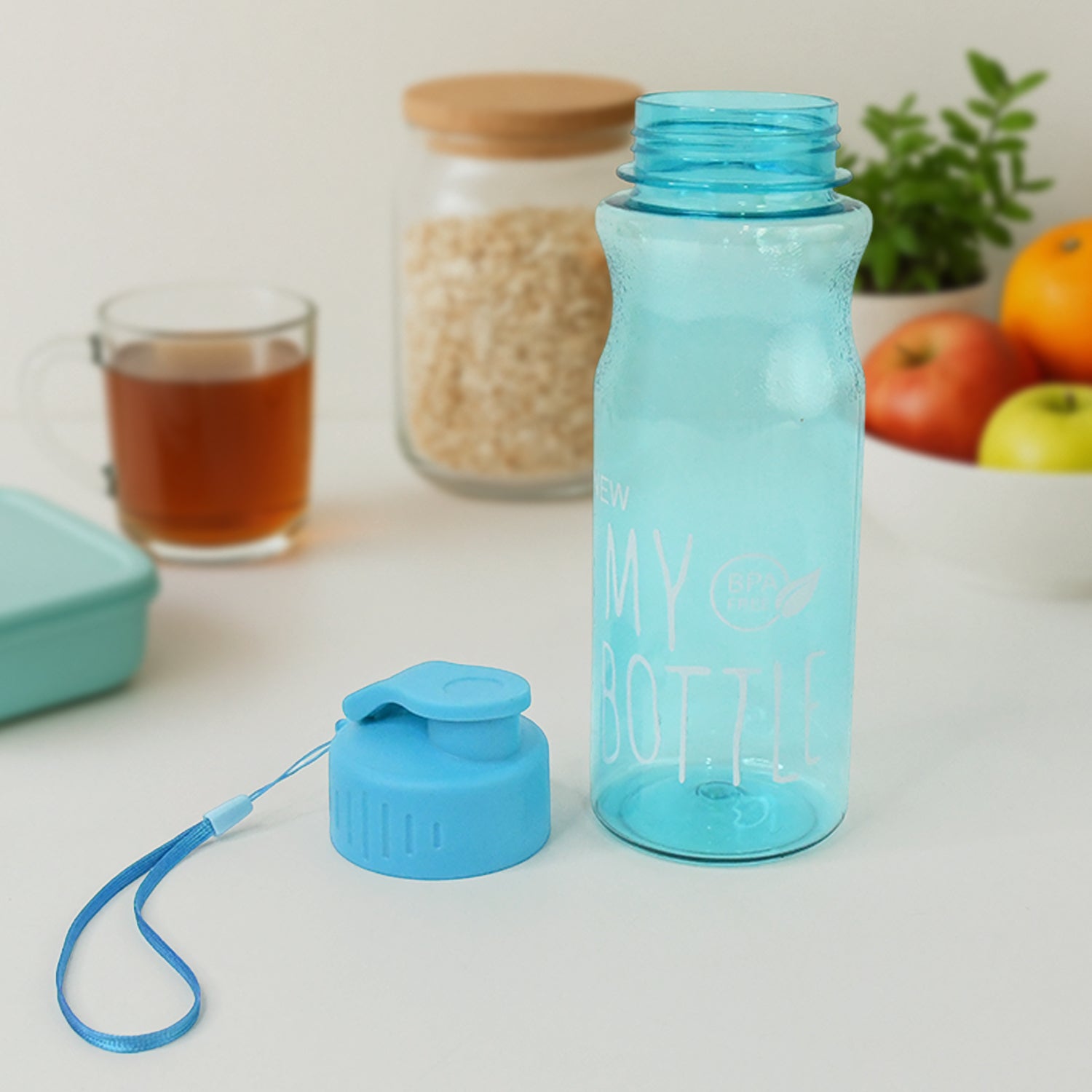 Transparent green BPA-free sports water bottle with wrist strap