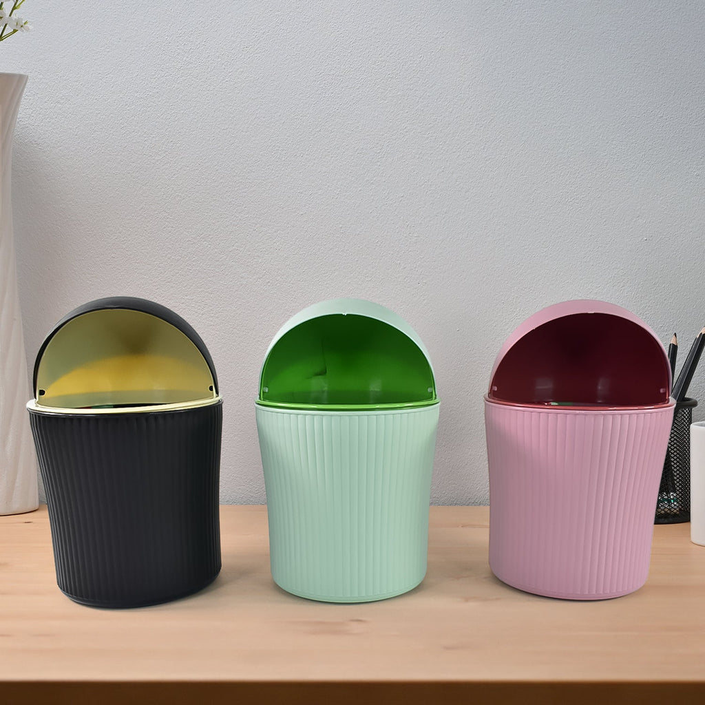 Compact tabletop trash can with durable swing lid design