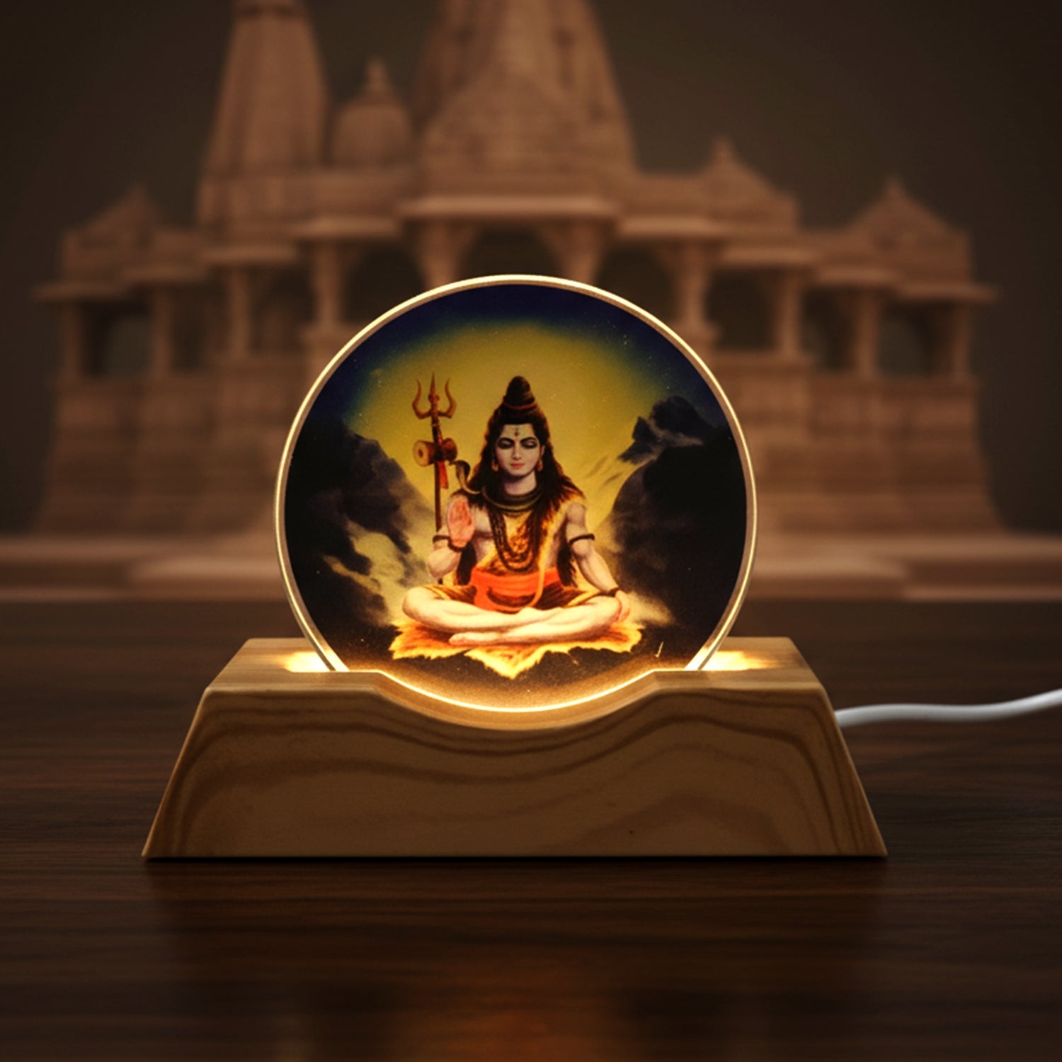 Soft warm glow of Lord Shiva LED night light illuminating bedroom corner