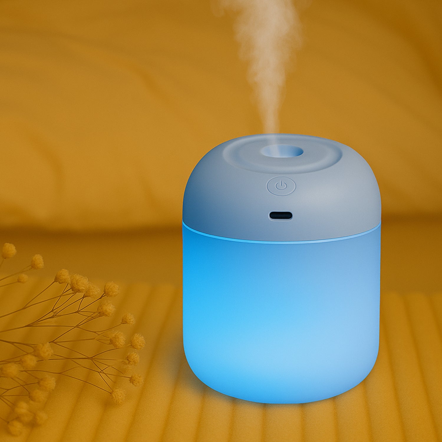 Detailed view of the top controls and mist outlet on a Mini USB Humidifier.