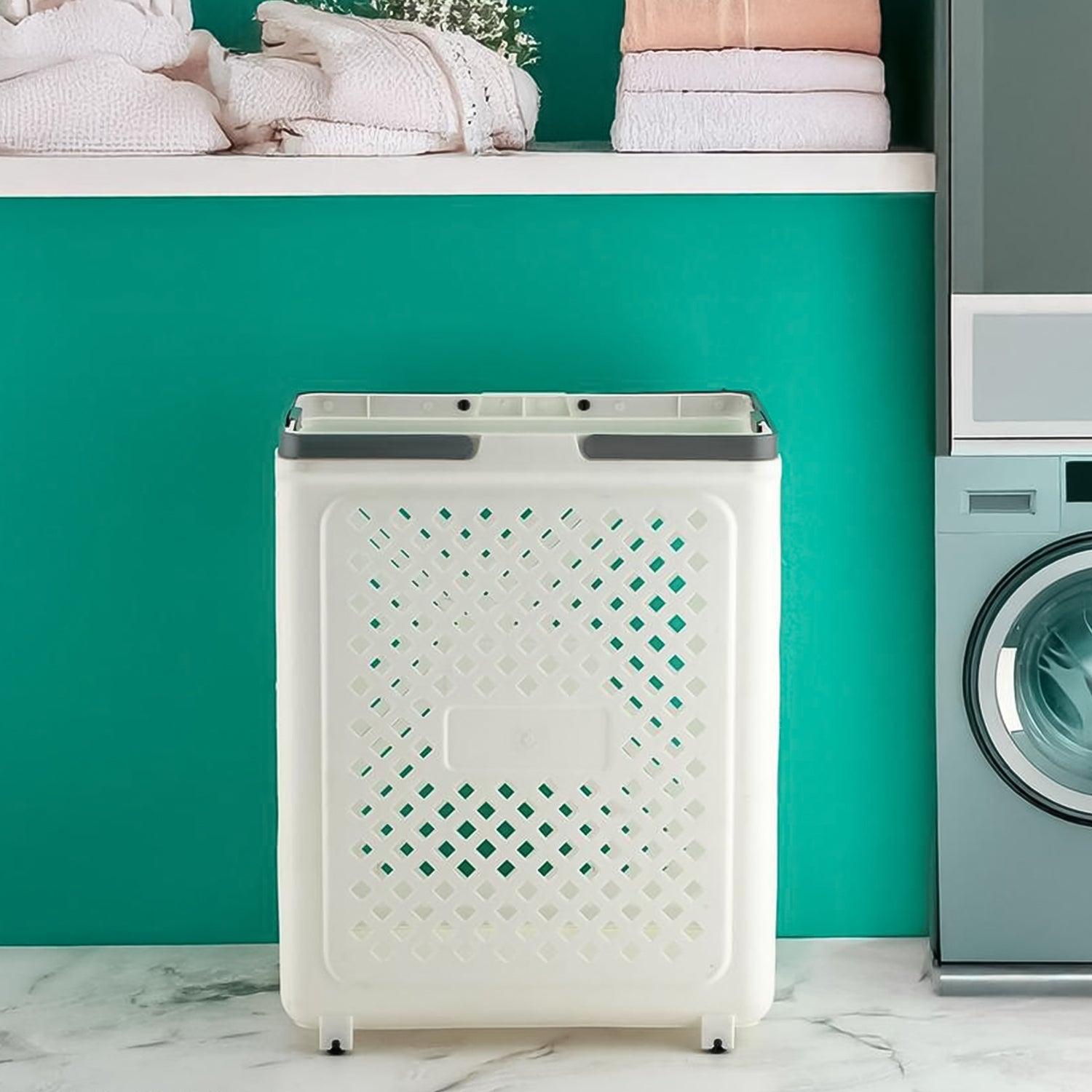 Close-up of foldable laundry basket showing ventilation holes and plastic material