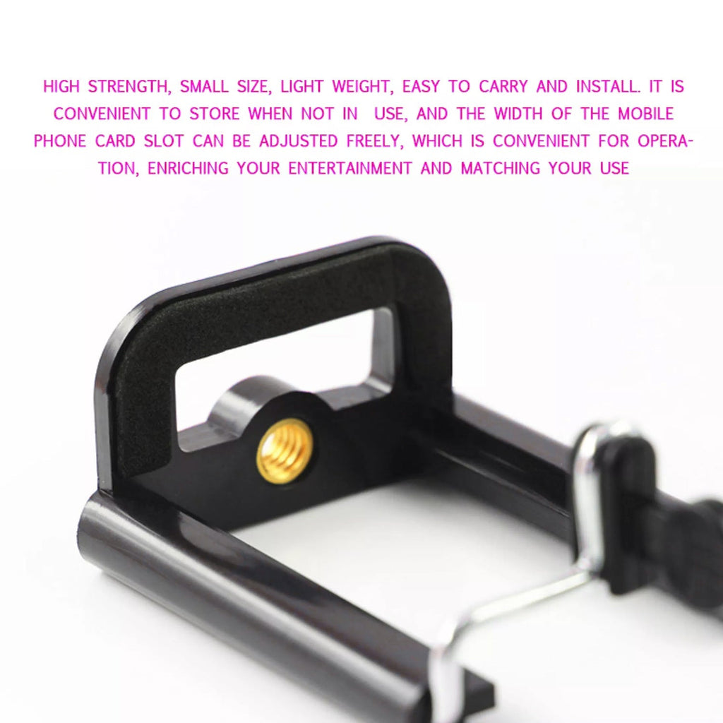 Adjustable mobile holder attachment demonstrating its strong spring-loaded grip.
