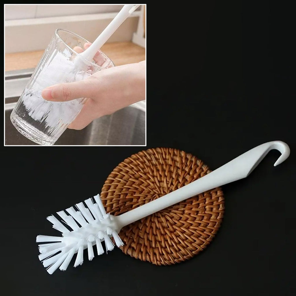 Cleaning brush with white handle and sturdy bristles for kitchen use