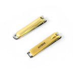Multiple stainless steel nail clippers in a mixed design, showcasing product variety.