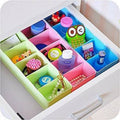 Organivo 4-piece drawer organizer set with 5 grid compartments, displayed on a clean white background.