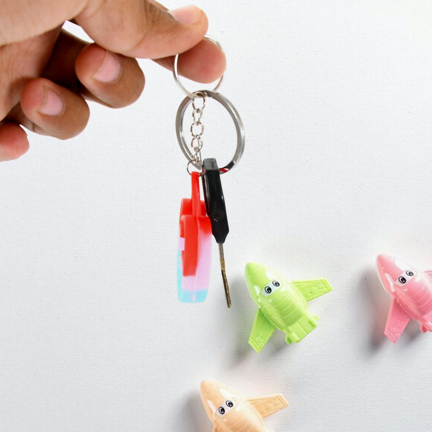 An overhead view of a Pop It Keychain, emphasizing its compact size and fun design.