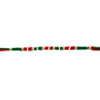 Red green and gold wire rakhi showcasing decorative craftsmanship