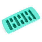 Side view of the portable ice tray, showcasing its compact design on a table.
