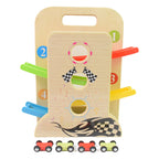 Child playing with the eco-friendly wooden ramp racer and its four mini cars.