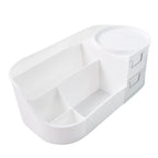 Makeup storage caddy featuring dual-layer drawers and rotating top tray