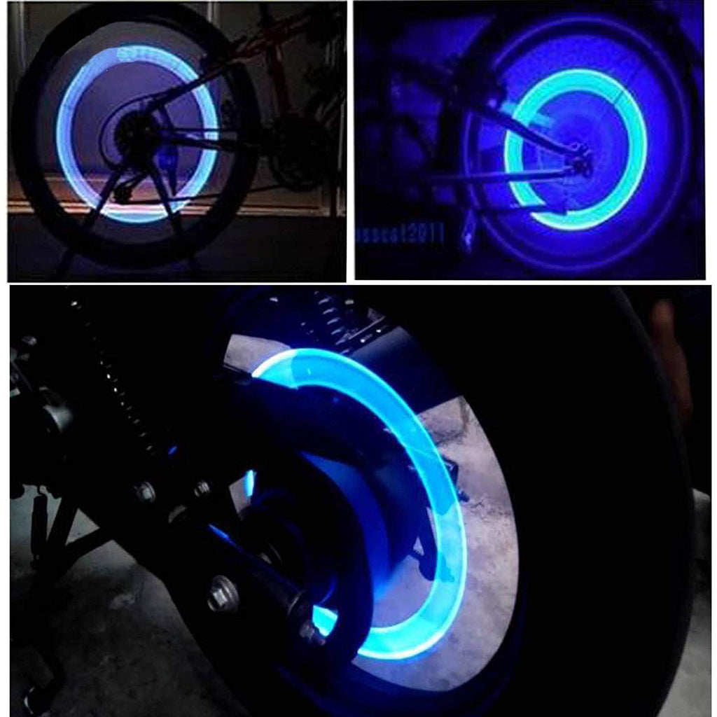 LED tyre valve caps glowing brightly on various vehicle tires to show versatility.