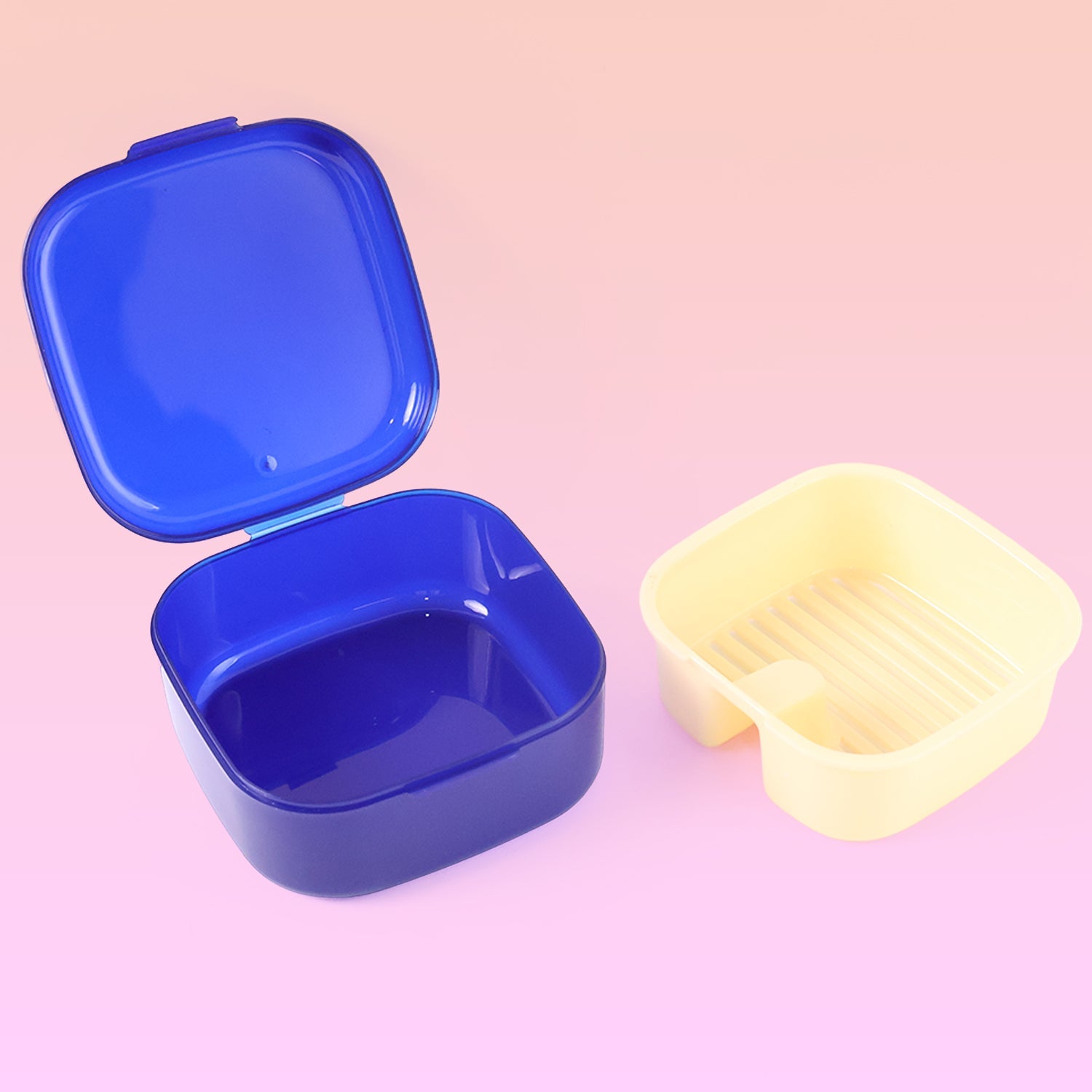 Detachable draining tray inside blue storage box