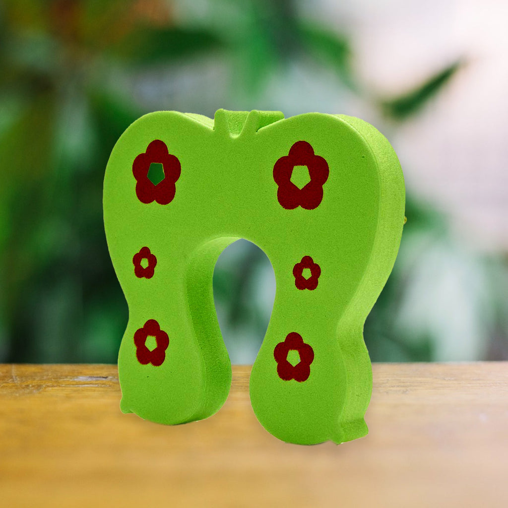 Soft foam animal door stopper, keeping doors secure for children.