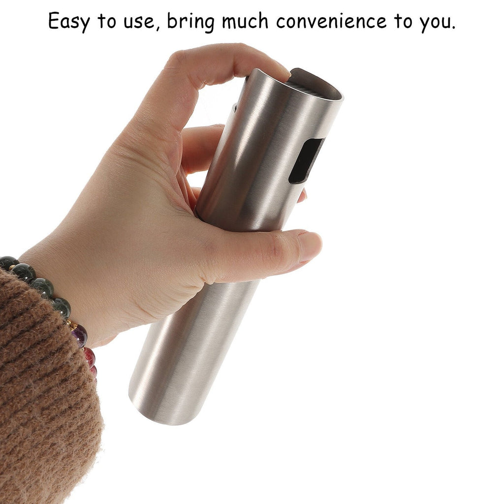 Multi-purpose oil and vinegar spray bottle for Indian cooking.