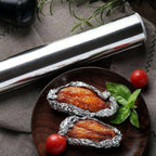 Heavy-duty non-stick aluminum foil roll for kitchen use.