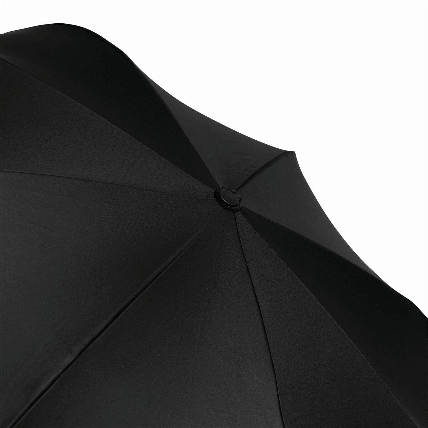 Kids umbrella compactly folded with a secure carrying strap.