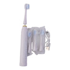 Electric toothbrush set displayed with three replacement brush heads