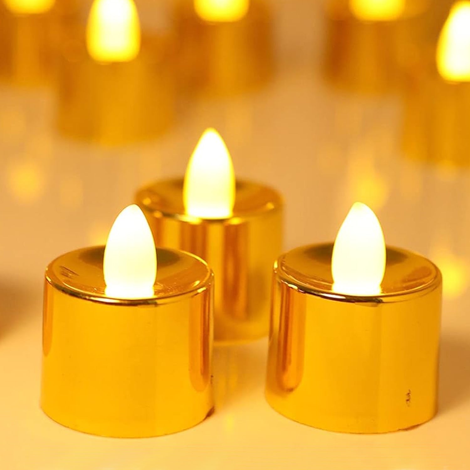 Six LED fake candles glowing brightly for festive ambiance.