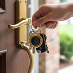 Premium gold and black keychain with durable metal ring for everyday use.