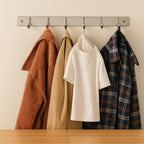 Rust-resistant surface detail of stainless steel wall-mounted coat rack