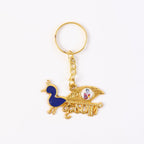 Krishna keychain showing detailed enamel work on peacock charm