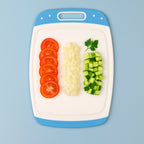 Side view of the Pro Clean plastic chopping board, highlighting its robust design.