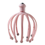 Ergonomically designed head massager for comfortable grip and use.
