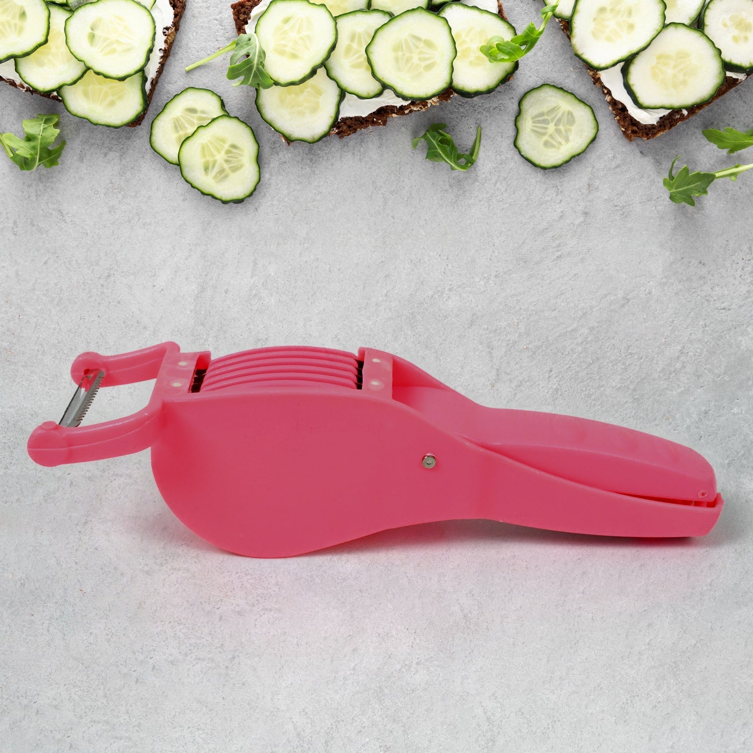 Multicolor 2-in-1 vegetable cutter with peeler from Quickslice for efficient kitchen prep.