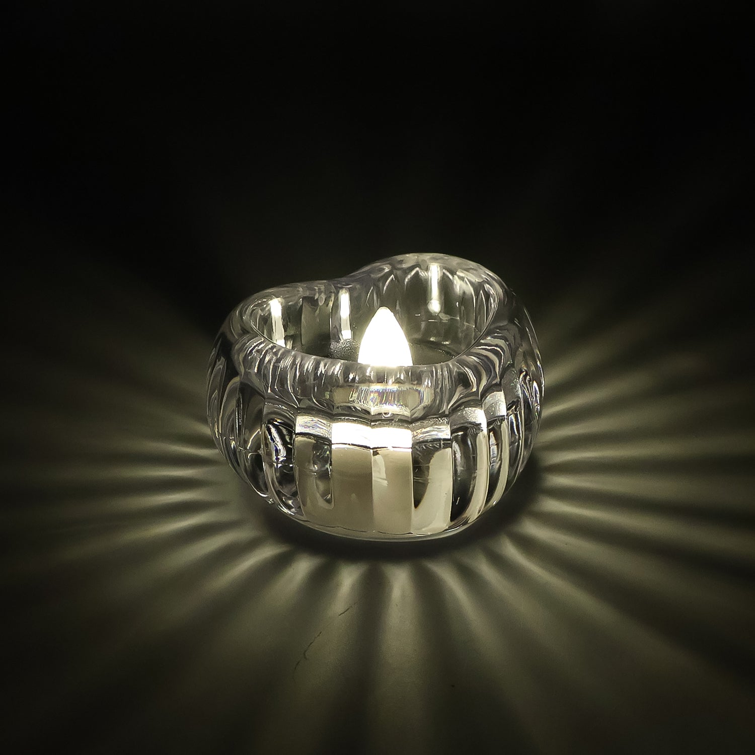 6-piece set of LED crystal flameless tealight candles glowing warmly
