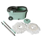 A person demonstrating the hands-free wringing mechanism of the Ganesh Spin Mop with Bucket.