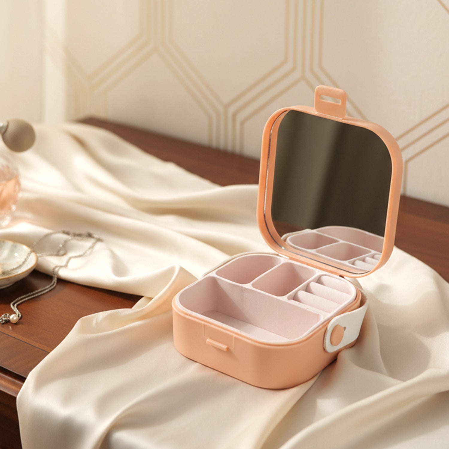 Detail shot of mini jewelry storage box with secure closure and mirror