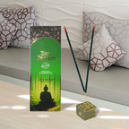Agarbatti sticks burning gently during a traditional puja ceremony, creating a sacred atmosphere.